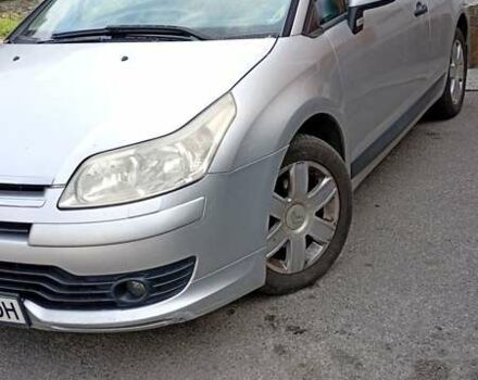 Серый Ситроен С4, объемом двигателя 1.59 л и пробегом 244 тыс. км за 4100 $, фото 1 на Automoto.ua