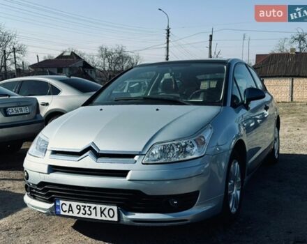 Серый Ситроен С4, объемом двигателя 1.4 л и пробегом 142 тыс. км за 3900 $, фото 1 на Automoto.ua