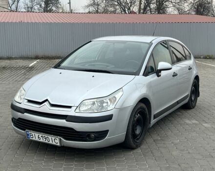 Серый Ситроен С4, объемом двигателя 1.6 л и пробегом 300 тыс. км за 3999 $, фото 1 на Automoto.ua