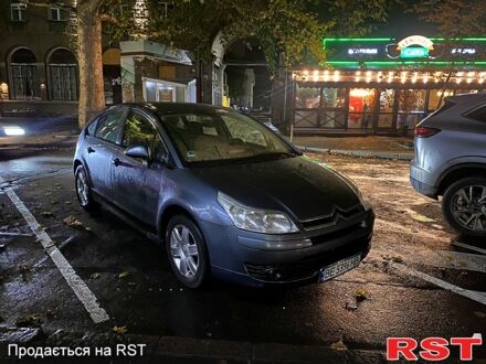 Серый Ситроен С4, объемом двигателя 1.6 л и пробегом 234 тыс. км за 6000 $, фото 1 на Automoto.ua