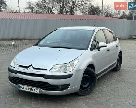 Серый Ситроен С4, объемом двигателя 1.6 л и пробегом 310 тыс. км за 3550 $, фото 1 на Automoto.ua