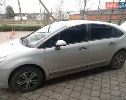 Серый Ситроен С4, объемом двигателя 1.4 л и пробегом 215 тыс. км за 3500 $, фото 1 на Automoto.ua