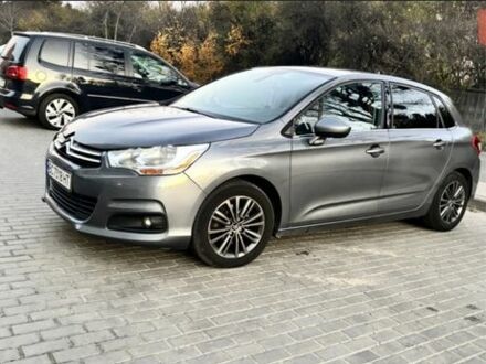 Серый Ситроен С4, объемом двигателя 1.6 л и пробегом 256 тыс. км за 7500 $, фото 1 на Automoto.ua