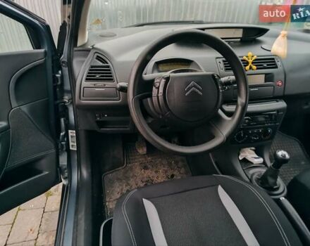 Синий Ситроен С4, объемом двигателя 1.4 л и пробегом 195 тыс. км за 3400 $, фото 3 на Automoto.ua