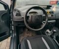 Синий Ситроен С4, объемом двигателя 1.4 л и пробегом 195 тыс. км за 3400 $, фото 3 на Automoto.ua