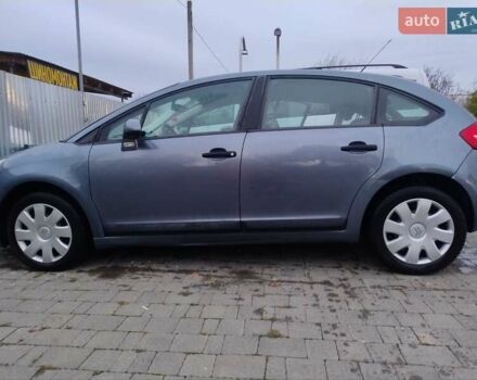 Синий Ситроен С4, объемом двигателя 1.4 л и пробегом 195 тыс. км за 3400 $, фото 1 на Automoto.ua