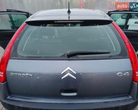 Синий Ситроен С4, объемом двигателя 1.4 л и пробегом 195 тыс. км за 3400 $, фото 2 на Automoto.ua