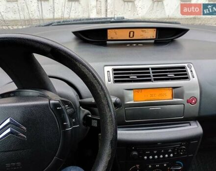 Синий Ситроен С4, объемом двигателя 1.6 л и пробегом 275 тыс. км за 3500 $, фото 3 на Automoto.ua