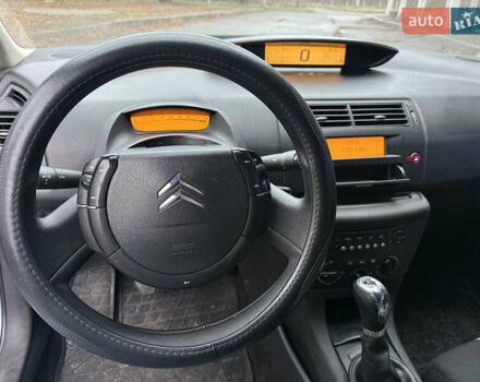 Синий Ситроен С4, объемом двигателя 1.59 л и пробегом 182 тыс. км за 3900 $, фото 44 на Automoto.ua