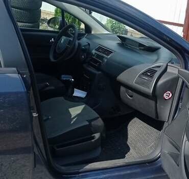 Синий Ситроен С4, объемом двигателя 1.6 л и пробегом 334 тыс. км за 5550 $, фото 18 на Automoto.ua