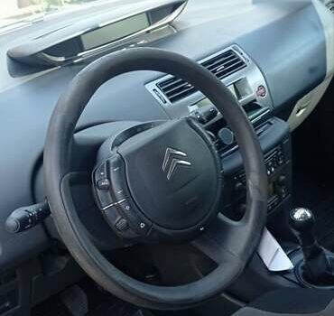 Синий Ситроен С4, объемом двигателя 1.6 л и пробегом 334 тыс. км за 5550 $, фото 11 на Automoto.ua