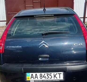 Синий Ситроен С4, объемом двигателя 1.6 л и пробегом 334 тыс. км за 5550 $, фото 1 на Automoto.ua