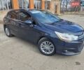 Синий Ситроен С4, объемом двигателя 1.6 л и пробегом 144 тыс. км за 7550 $, фото 1 на Automoto.ua
