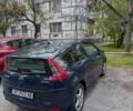 Синий Ситроен С4, объемом двигателя 1.59 л и пробегом 295 тыс. км за 3100 $, фото 1 на Automoto.ua