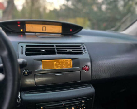 Синій Сітроен С4, об'ємом двигуна 1.59 л та пробігом 242 тис. км за 2399 $, фото 14 на Automoto.ua