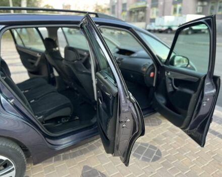 Синий Ситроен С4, объемом двигателя 1.7 л и пробегом 298 тыс. км за 4500 $, фото 14 на Automoto.ua