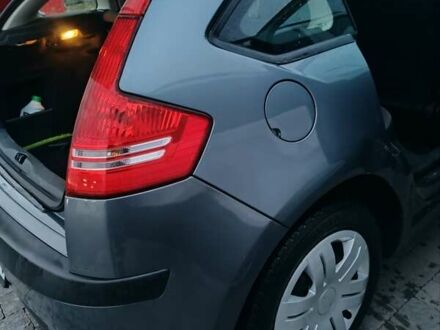 Синий Ситроен С4, объемом двигателя 1.4 л и пробегом 195 тыс. км за 3400 $, фото 1 на Automoto.ua