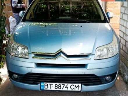 Синий Ситроен С4, объемом двигателя 1.6 л и пробегом 306 тыс. км за 4500 $, фото 1 на Automoto.ua