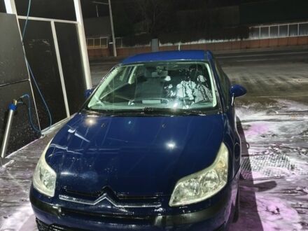 Синий Ситроен С4, объемом двигателя 1.6 л и пробегом 295 тыс. км за 3500 $, фото 1 на Automoto.ua