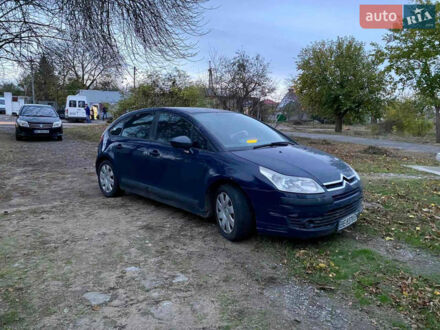 Синий Ситроен С4, объемом двигателя 1.6 л и пробегом 241 тыс. км за 4150 $, фото 1 на Automoto.ua