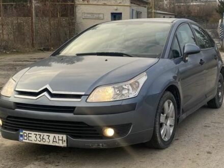 Синий Ситроен С4, объемом двигателя 1.6 л и пробегом 215 тыс. км за 2800 $, фото 1 на Automoto.ua