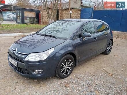 Синий Ситроен С4, объемом двигателя 1.59 л и пробегом 132 тыс. км за 4500 $, фото 1 на Automoto.ua