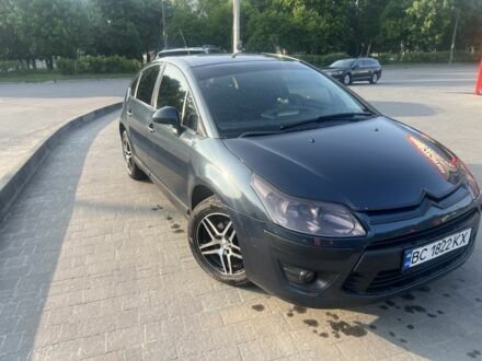 Синий Ситроен С4, объемом двигателя 1.4 л и пробегом 230 тыс. км за 5500 $, фото 1 на Automoto.ua