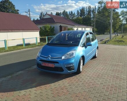 Синий Ситроен С4, объемом двигателя 1.59 л и пробегом 247 тыс. км за 5150 $, фото 1 на Automoto.ua