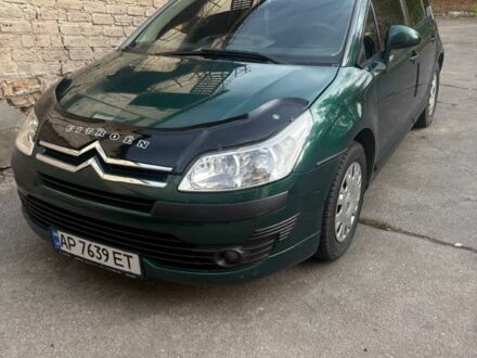 Зеленый Ситроен С4, объемом двигателя 1.4 л и пробегом 142 тыс. км за 3800 $, фото 1 на Automoto.ua