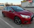 Красный Ситроен ДС4, объемом двигателя 1.56 л и пробегом 134 тыс. км за 11799 $, фото 1 на Automoto.ua