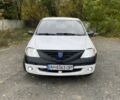 Белый Дачия Логан, объемом двигателя 1.4 л и пробегом 253 тыс. км за 1499 $, фото 1 на Automoto.ua