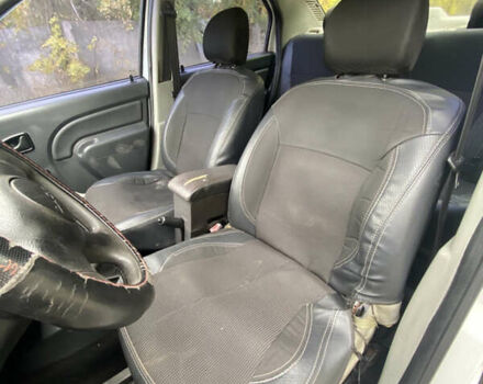 Белый Дачия Логан, объемом двигателя 1.4 л и пробегом 254 тыс. км за 1399 $, фото 9 на Automoto.ua