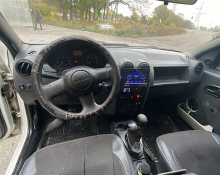 Белый Дачия Логан, объемом двигателя 1.4 л и пробегом 254 тыс. км за 1399 $, фото 8 на Automoto.ua