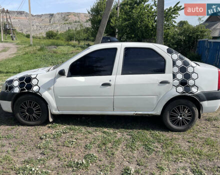 Белый Дачия Логан, объемом двигателя 1.39 л и пробегом 247 тыс. км за 1558 $, фото 1 на Automoto.ua