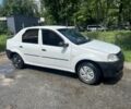 Белый Дачия Логан, объемом двигателя 1.4 л и пробегом 265 тыс. км за 1600 $, фото 1 на Automoto.ua