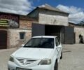 Белый Дачия Логан, объемом двигателя 2 л и пробегом 558 тыс. км за 3800 $, фото 1 на Automoto.ua