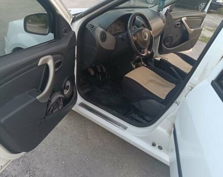 Белый Дачия Логан, объемом двигателя 1.46 л и пробегом 310 тыс. км за 3600 $, фото 10 на Automoto.ua