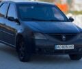 Чорний Дачія Logan, об'ємом двигуна 1.39 л та пробігом 318 тис. км за 2350 $, фото 1 на Automoto.ua