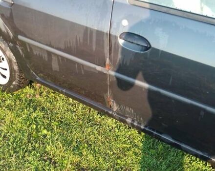 Чорний Дачія Logan, об'ємом двигуна 1.4 л та пробігом 176 тис. км за 1500 $, фото 20 на Automoto.ua