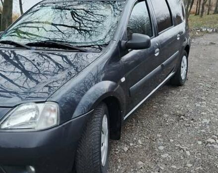 Черный Дачия Логан, объемом двигателя 1.6 л и пробегом 226 тыс. км за 4700 $, фото 24 на Automoto.ua