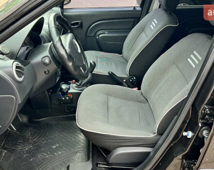 Дачия Логан 2012 в Кривом Роге на Automoto.ua Черный Дачия Логан, объемом двигателя 1.6 л и пробегом 175 тыс. км за 6999 $, фото 12 на Automoto.ua