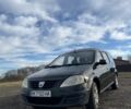 Черный Дачия Логан, объемом двигателя 1.4 л и пробегом 306 тыс. км за 3300 $, фото 1 на Automoto.ua