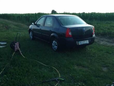 Черный Дачия Логан, объемом двигателя 1.4 л и пробегом 176 тыс. км за 1500 $, фото 1 на Automoto.ua