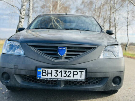 Черный Дачия Логан, объемом двигателя 1.39 л и пробегом 302 тыс. км за 2200 $, фото 1 на Automoto.ua