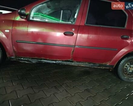 Червоний Дачія Logan, об'ємом двигуна 1.39 л та пробігом 333 тис. км за 999 $, фото 2 на Automoto.ua