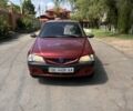 Красный Дачия Логан, объемом двигателя 1.4 л и пробегом 148 тыс. км за 1300 $, фото 1 на Automoto.ua