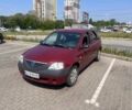 Красный Дачия Логан, объемом двигателя 1.6 л и пробегом 302 тыс. км за 3500 $, фото 1 на Automoto.ua