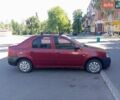 Красный Дачия Логан, объемом двигателя 1.4 л и пробегом 205 тыс. км за 4000 $, фото 1 на Automoto.ua