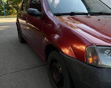 Красный Дачия Логан, объемом двигателя 1.4 л и пробегом 290 тыс. км за 2100 $, фото 1 на Automoto.ua