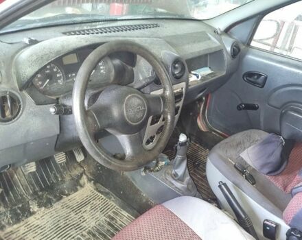 Красный Дачия Логан, объемом двигателя 1.4 л и пробегом 360 тыс. км за 900 $, фото 6 на Automoto.ua